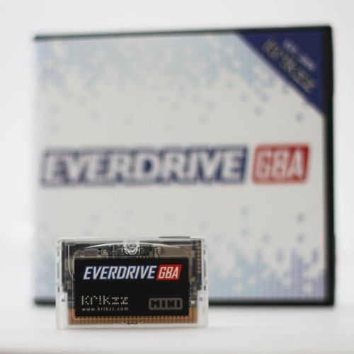 EverDrive GBA cart in front of a blurry box